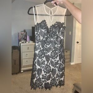 Black lace cocktail dress with mesh top